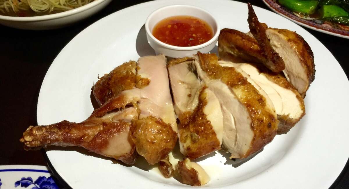 Hawker Fare’s gai yang, the grilled half chicken perfumed with lemongrass, is one of the restaurant’s best dishes.