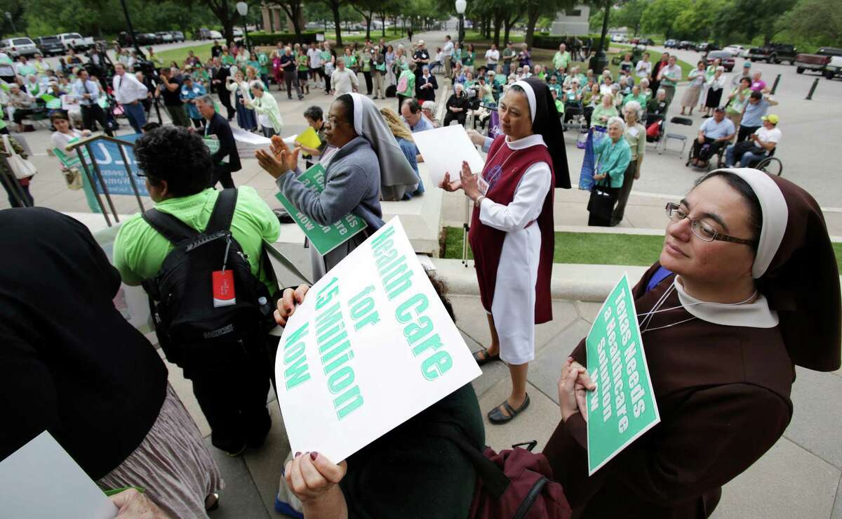 Texans have urged Gov. Rick Perry to allow the expansion of Medicaid under the Affordable Care Act. Greg Abbott, when he takes office, should do so. Sister Nohemi Lara CMST, right, of Houston joins close to 200 nuns from San Antonio, Houston, Corpus Christi, Fort Worth and their friends, as they marched to the south steps of the Texas Capitol in Austin, TX to voice their support for the Medicaid expansion last year.