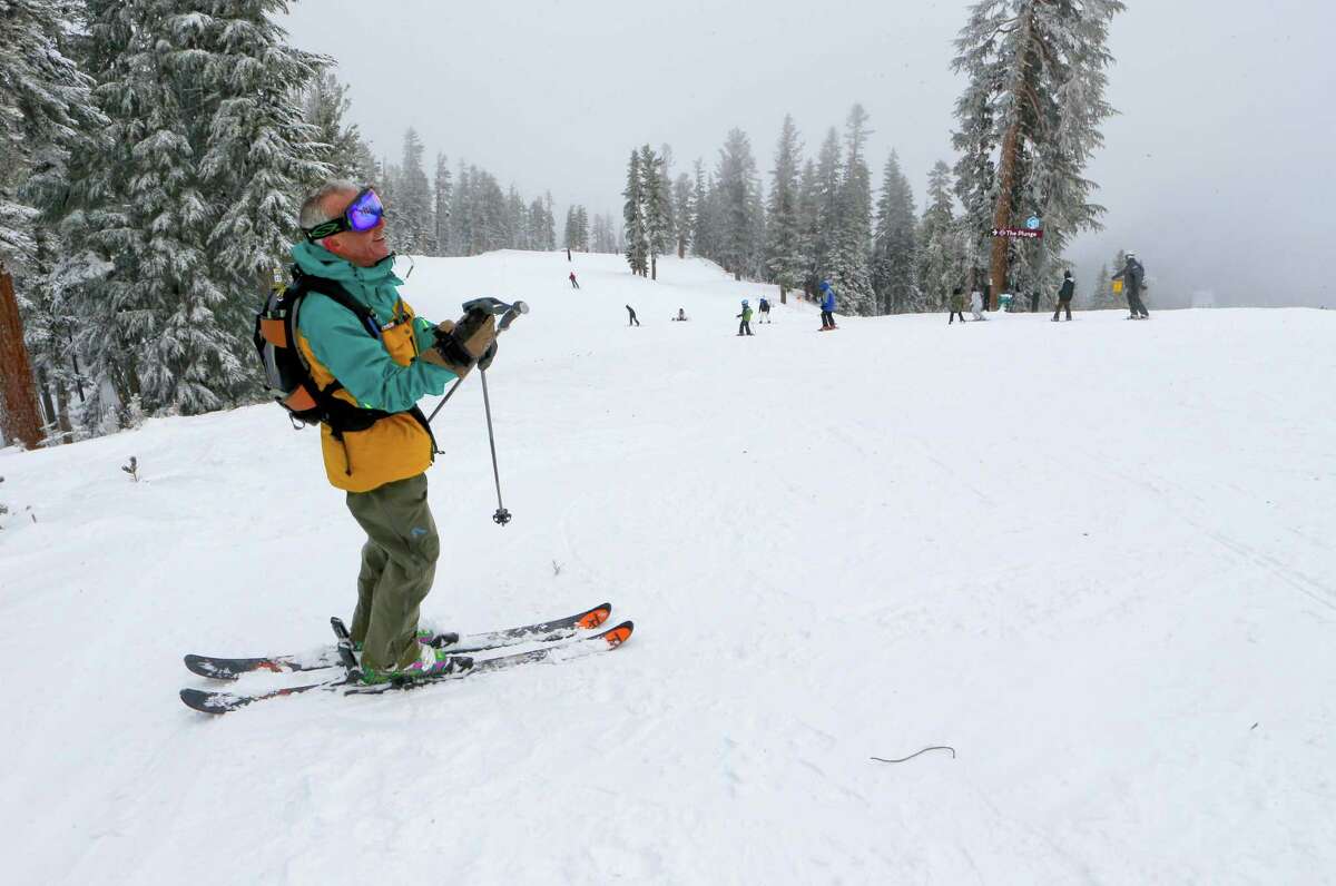 Skier Jim Dinsmore from Santa Cruz is all smiles as he prepares to take on on the newly fallen snow at Northstar California Resort in Truckee, Calif., on Friday Dec. 12, 2014.