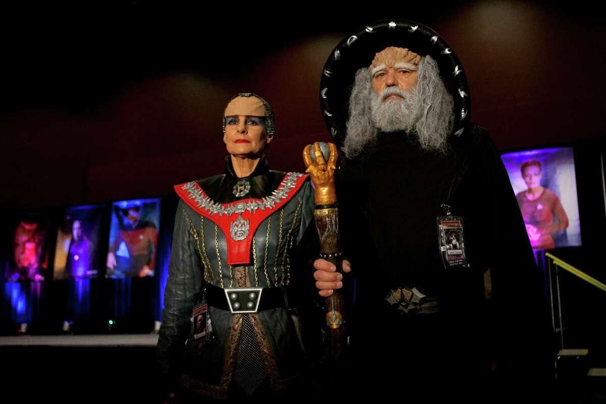 Kent Bass (right) and Chris Bass (left) of Yelm won first place in Star Trek Convention's costume contest dressed as the "Klingon Judge" and "Azetbur" in Bellevue on Saturday, Dec. 13, 2014.