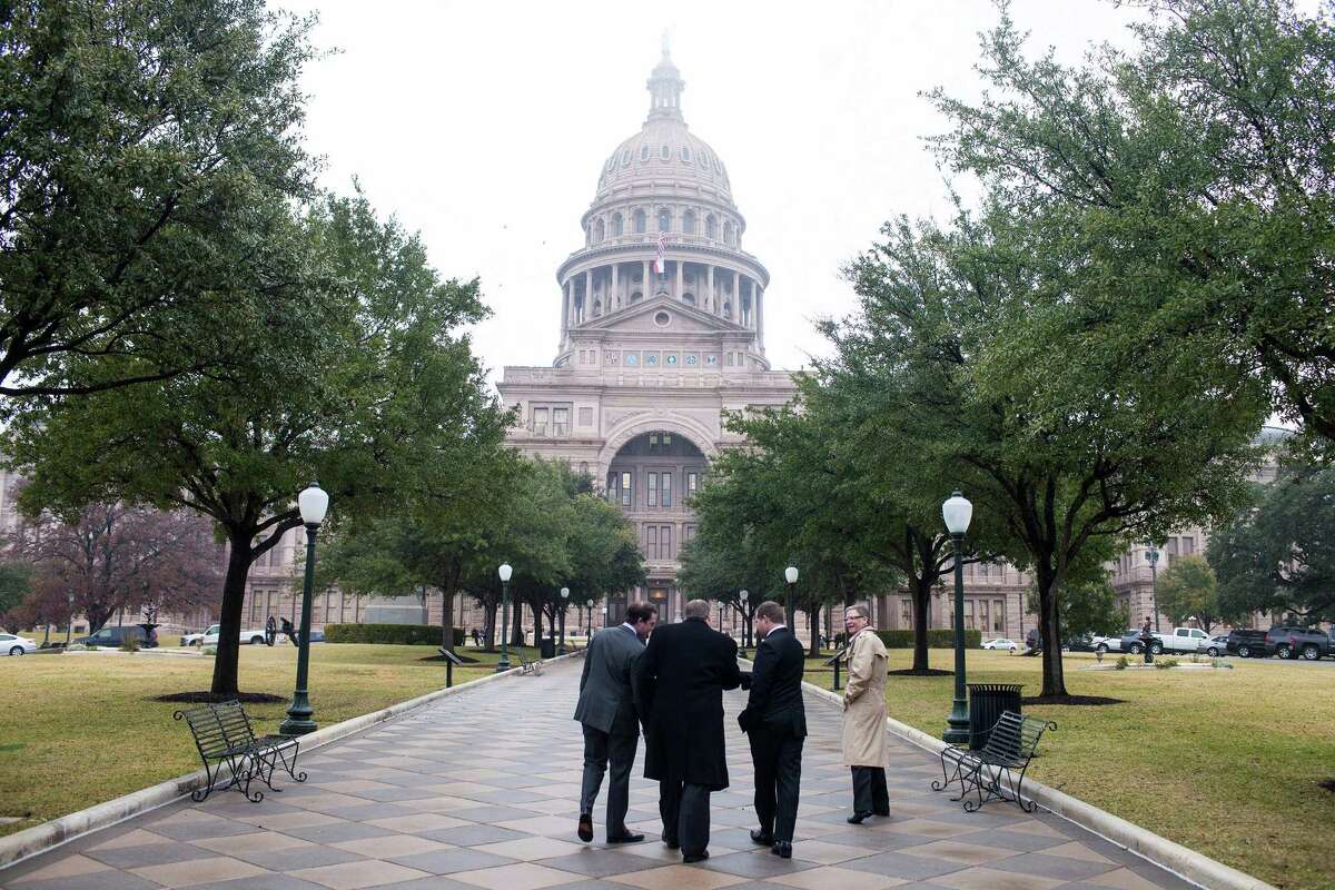 People gather outside the Texas State Capitol in Austin, Texas, Jan. 8, 2013. (Ben Sklar/The New York Times)