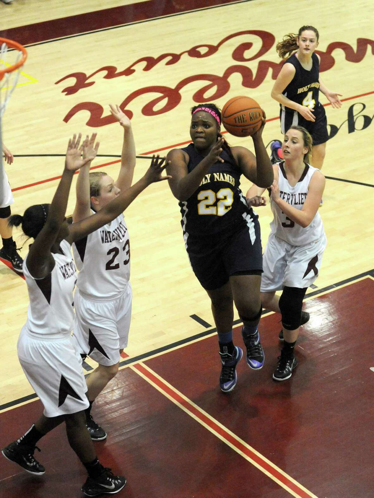 Holy Names Deja Deas drives to the hoop during their high school girl's basketball game against Watervliet on Tuesday Dec. 16, 2014 in Watervliet ,N.Y. (Michael P. Farrell/Times Union)