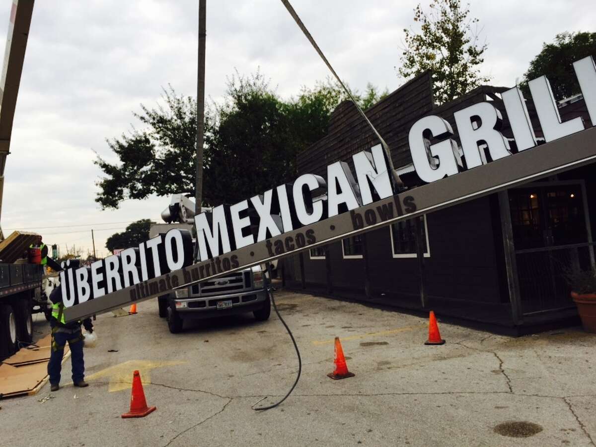 Crews got to work Wednesday renaming Houston classic "Mission Burrito". The chain of four restaurants in the area will now all be called "Überrito Mexican Grill" after restrictions in a lawsuit forced the owners to change.