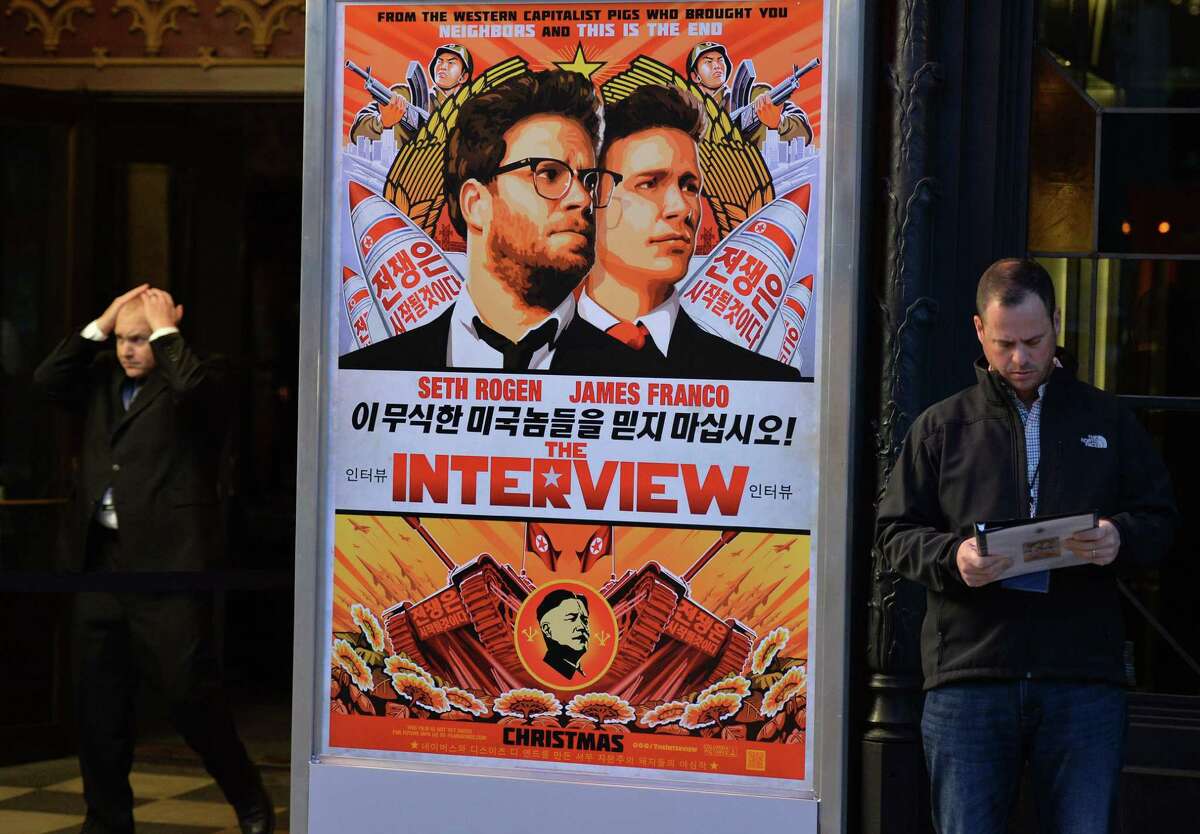 Security is seen outside The Theatre at Ace Hotel before the premiere of the film "The Interview" in Los Angeles, California on December 11, 2014. The film, starring US actors Seth Rogen and James Franco, is a comedy about a CIA plot to assassinate its leader Kim Jong-Un, played by Randall Park. North Korea has vowed "merciless retaliation" against what it calls a "wanton act of terror" -- although it has denied involvement in a massive cyber attack on Sony Pictures, the studio behind the film. AFP PHOTO/STR-/AFP/Getty Images