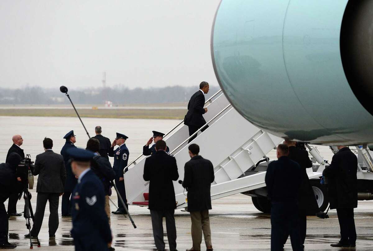 S President Barack Obama boards Air Force One recently in Washington, DC. While several readers have noted that the president earns only $400,000 a year, one reader says that the salary is augmented by perks that include the use of Air Force One.