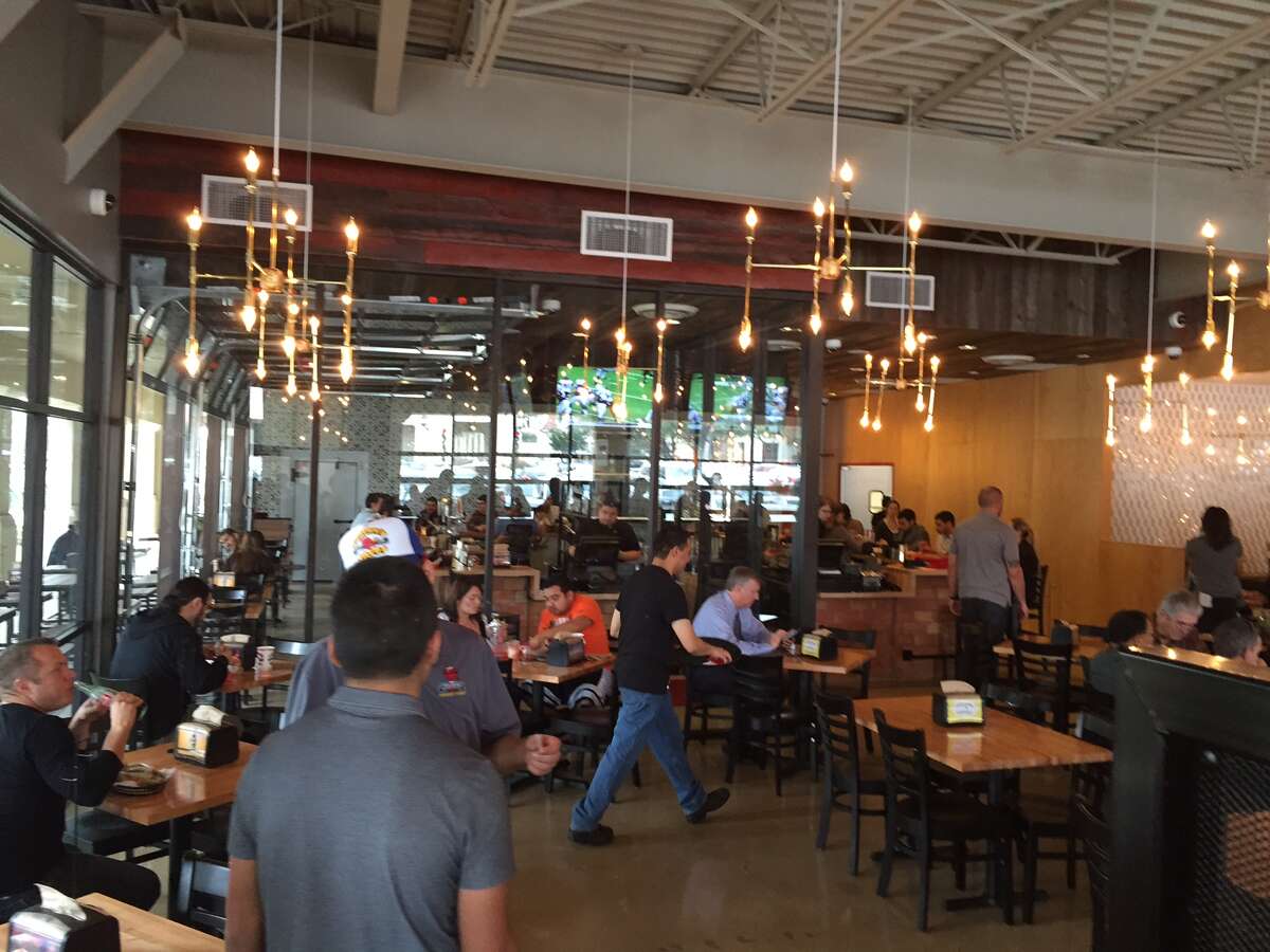 Torchy's Tacos' first location in San Antonio opened for business early Thursday at The Shops at Lincoln Heights to a large rush of people throughout the morning and lunch time hours.