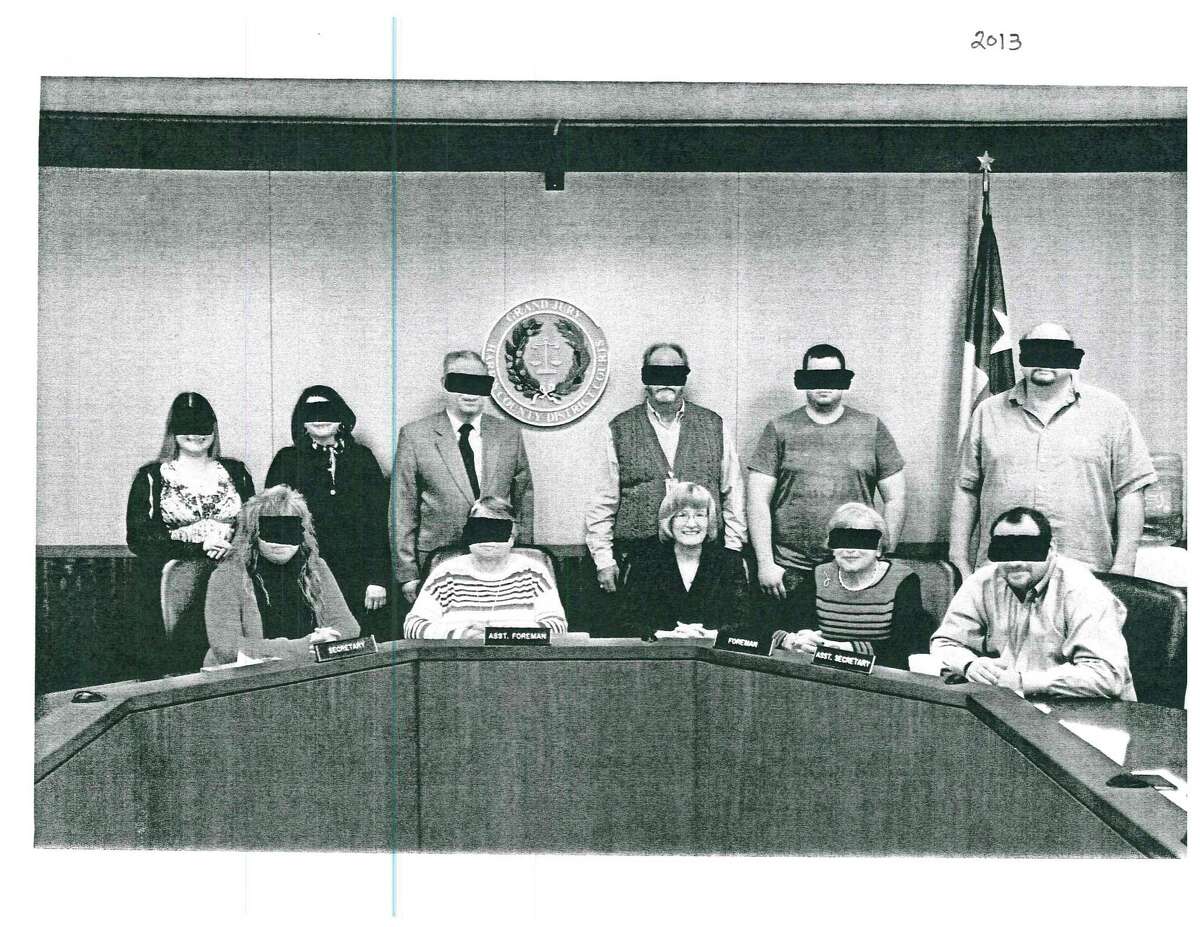 Judge Mary Lou Keel of the 232nd district provided group photos with black bands over the grand jurors' eyes to protect privacy.