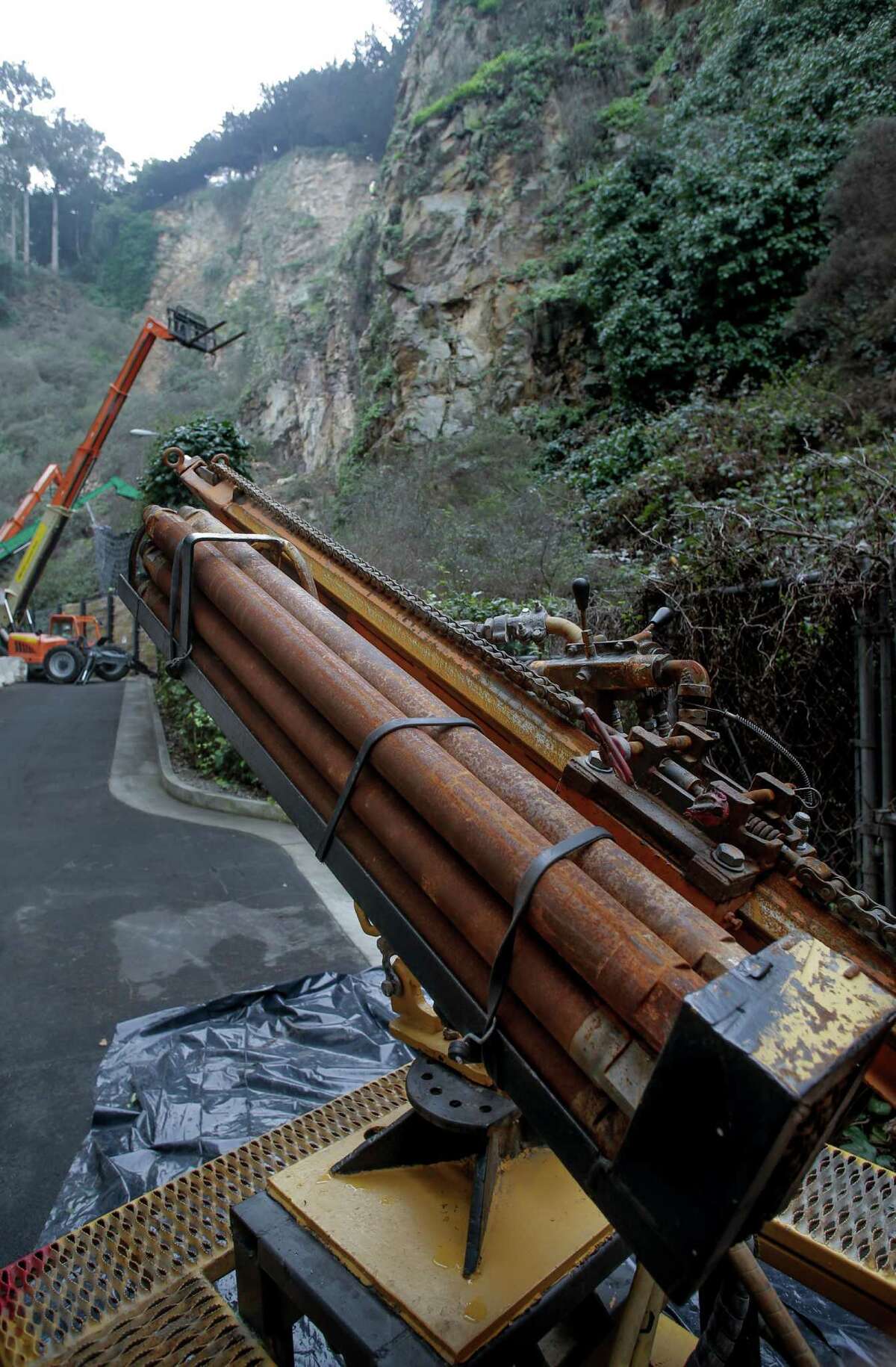 A pallet drill will be used to drill holes into solid rock for the 30 foot long anchors as the San Francisco Public Works department begins a six-month Telegraph Hill Rock Slope Improvement project to stabilize the crumbling cliff below Coit Tower in San Francisco, Calif. on Tuesday Dec. 9, 2014.