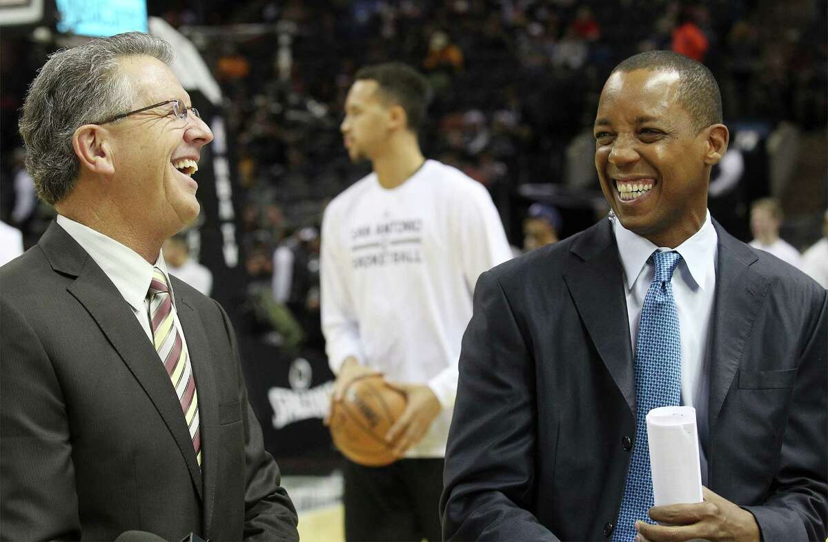 Spurs commentators Bill Land (left) and Sean Elliott share a laugh during a taping of their show at the AT&T Center on Friday, Dec. 12, 2014.