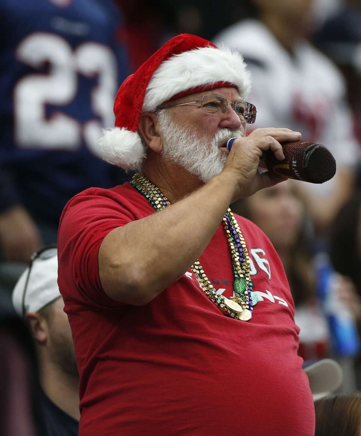 A 16-ounce domestic bottled beer will cost Texans fans less money during the 2022 season.