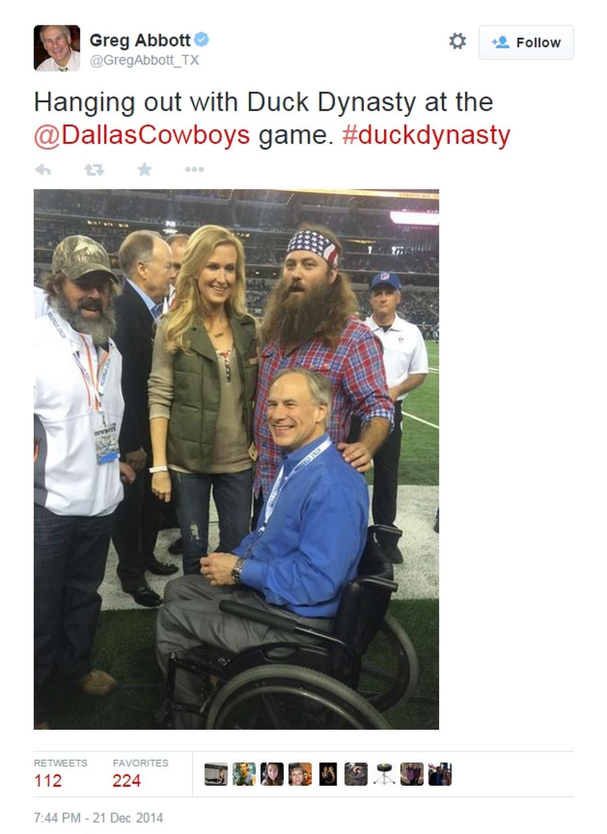 Governor-elect Greb Abbott spent some time with stars of "Duck Dynasty" at a Dallas Cowboys game.
