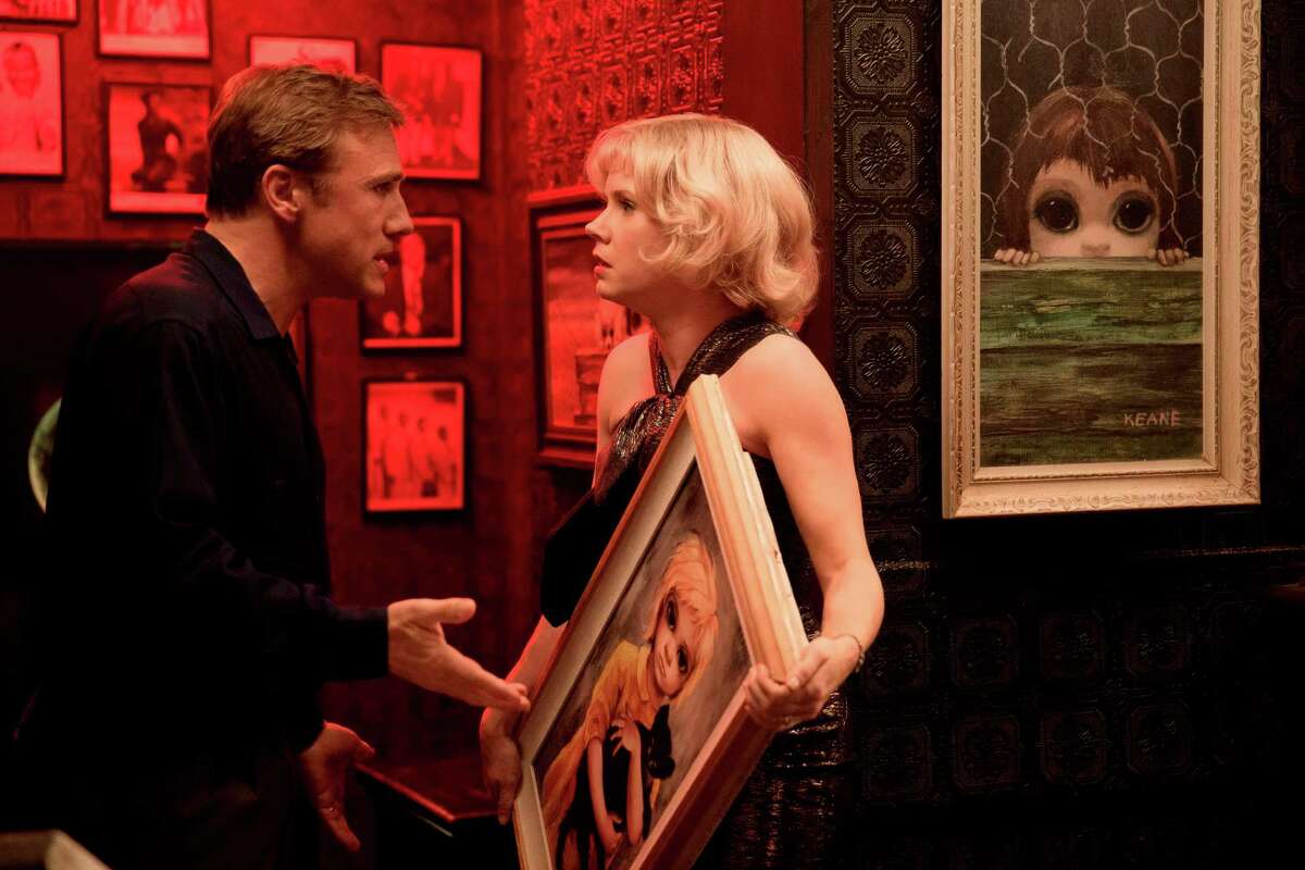 In this image released by The Weinstein Company, Christoph Waltz, left, and Amy Adams appear in a scene from "Big Eyes." (AP Photo/The Weinstein Company, Leah Gallo)