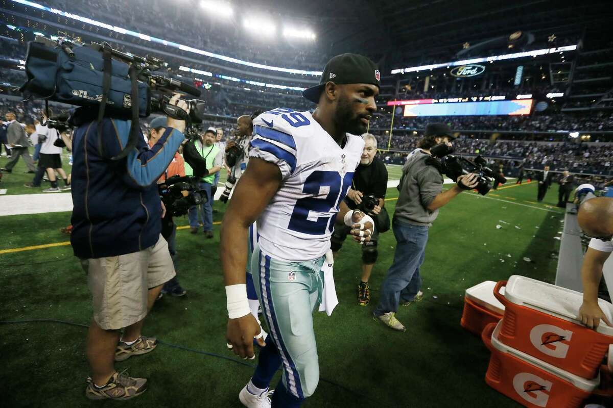 Cowboys running back DeMarco Murray (29), who played after having surgery last week to repair a broken left hand, leaves the field after the 42-7 victory over the Indianapolis Colts.
