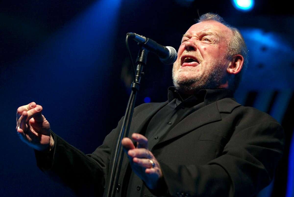 JOE COCKER, 1944-2014. In this July 20, 2002 file photo, British Rock and Blues legend Joe Cocker performs on stage of the Stravinski hall during the Montreux Jazz Festival, in Montreux, Switzerland. Cocker, best known for the songs, "You Are So Beautiful," and the 1980s duet "Up Where We Belong," with Jennifer Warnes, died Monday, Dec. 22, 2014 of lung cancer in Colorado. He was 70. (AP Photo/Keystone, Fabrice Coffrini, File) ORG XMIT: NYET101