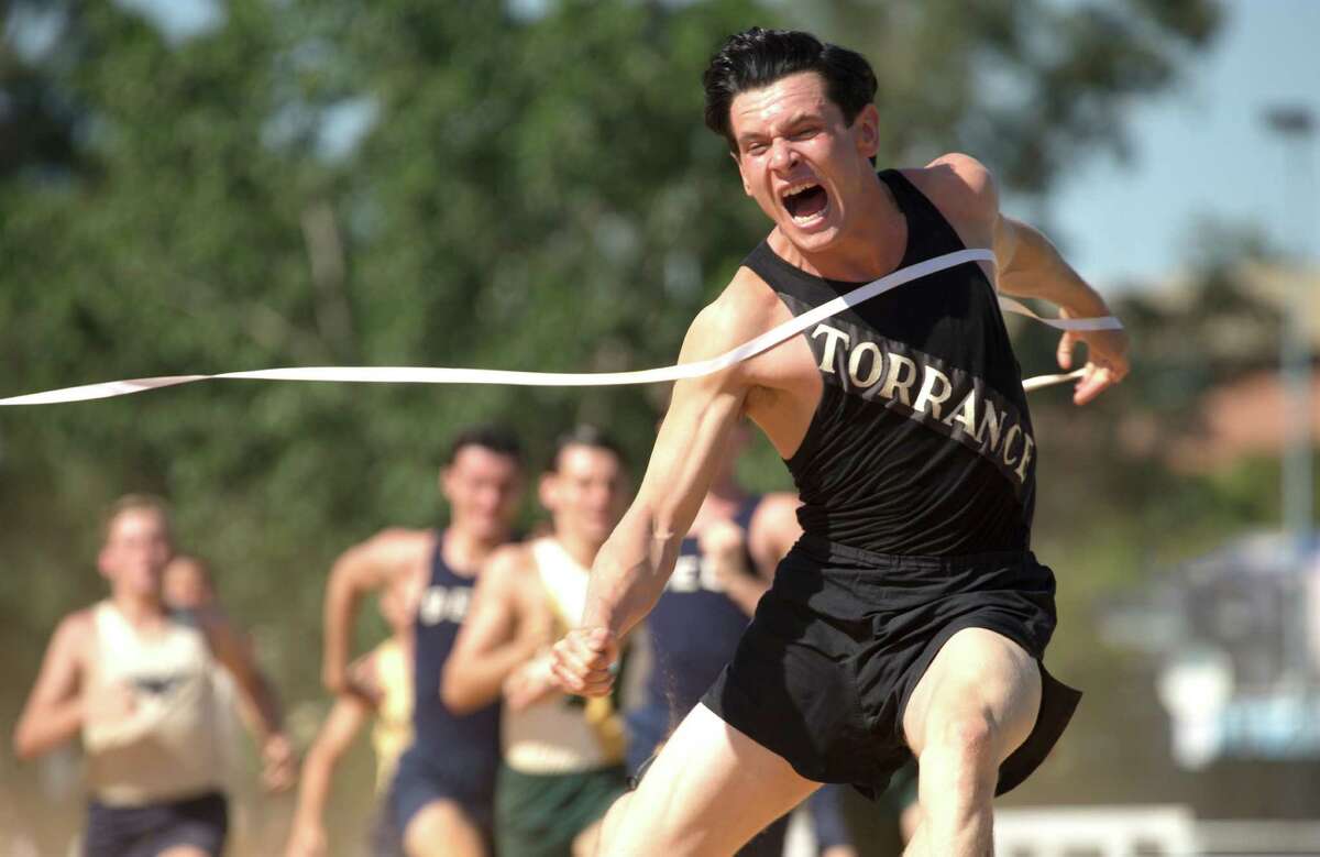 Jack O’Connell as Louis Zamperini, who made the U.S. track team in the 1936 Olympics, in “Unbroken,” which is directed by Angelina Jolie.