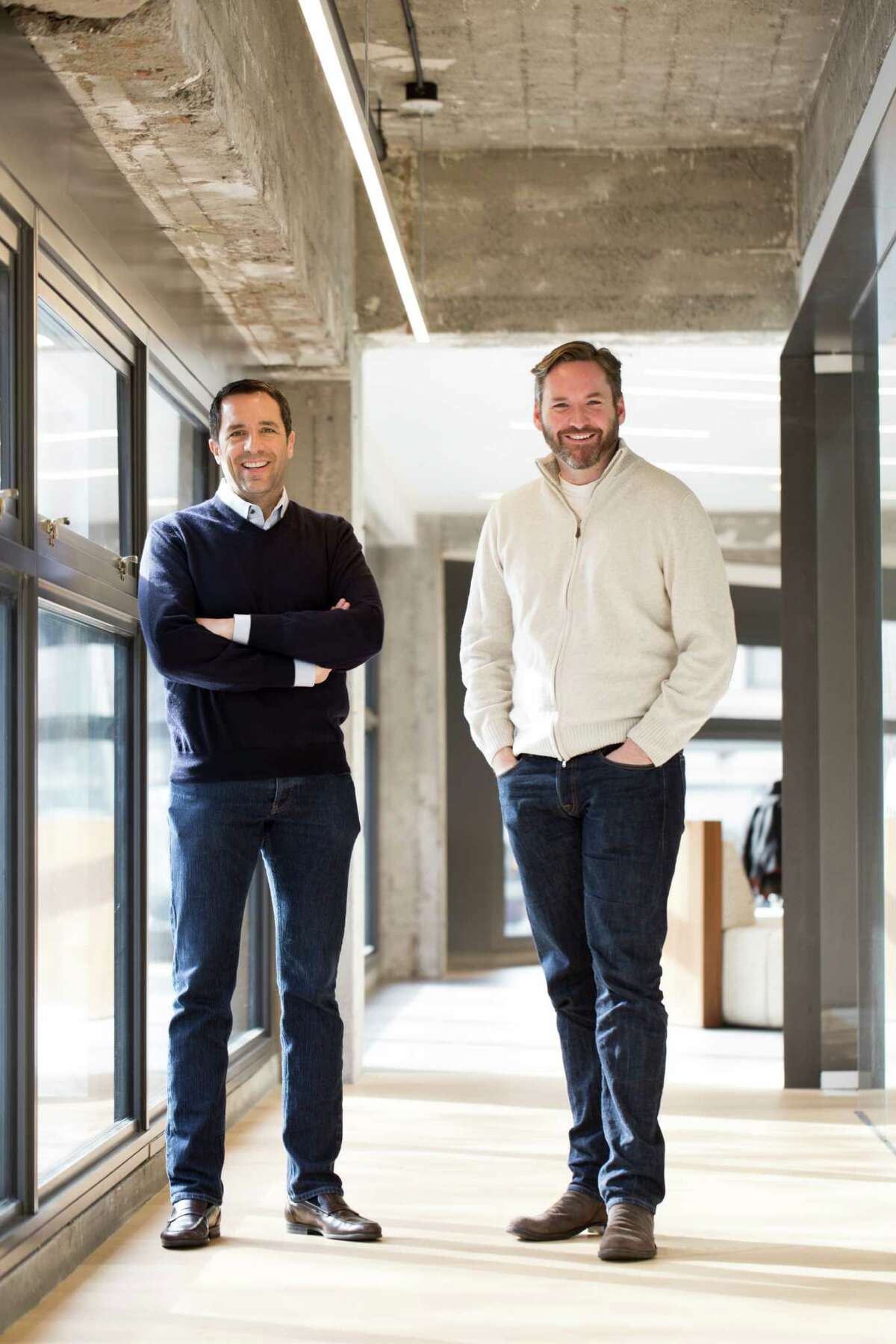 Stuart Peterson (left) and Mike Harden are co-founders of Artis Ventures in the Warfield bui.