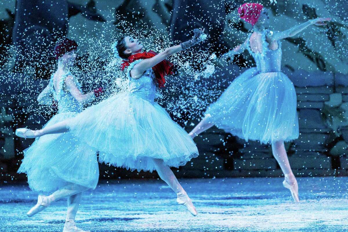 Dancers move through a heavier-than-usual snowfall during the final, annual "nutty" Christmas Eve performance of Pacific Northwest Ballet?•s Nutcracker Wednesday, Dec. 24, 2014, at McCaw Hall in Seattle, Washington. The final showing of the Stowell and Sendak Nutcracker is Sunday, Dec. 28, 2014.