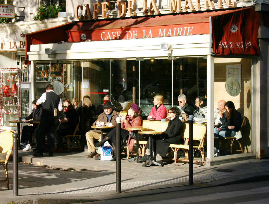 Rick Steves Paris In Winter Sfgate No Matter The Weather Many Parisians Sip Their Cafe Crème On An Outside Terrace