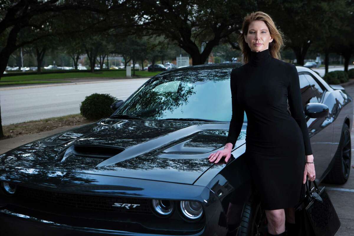 Terra Nicolay is an executive at Chevron who became one of the first people in Texas to own a Dodge Challenger Hellcat, the new muscle car that boasts the most powerful engine ever placed in a standard production American car. Saturday, Dec. 6, 2014, in Houston.