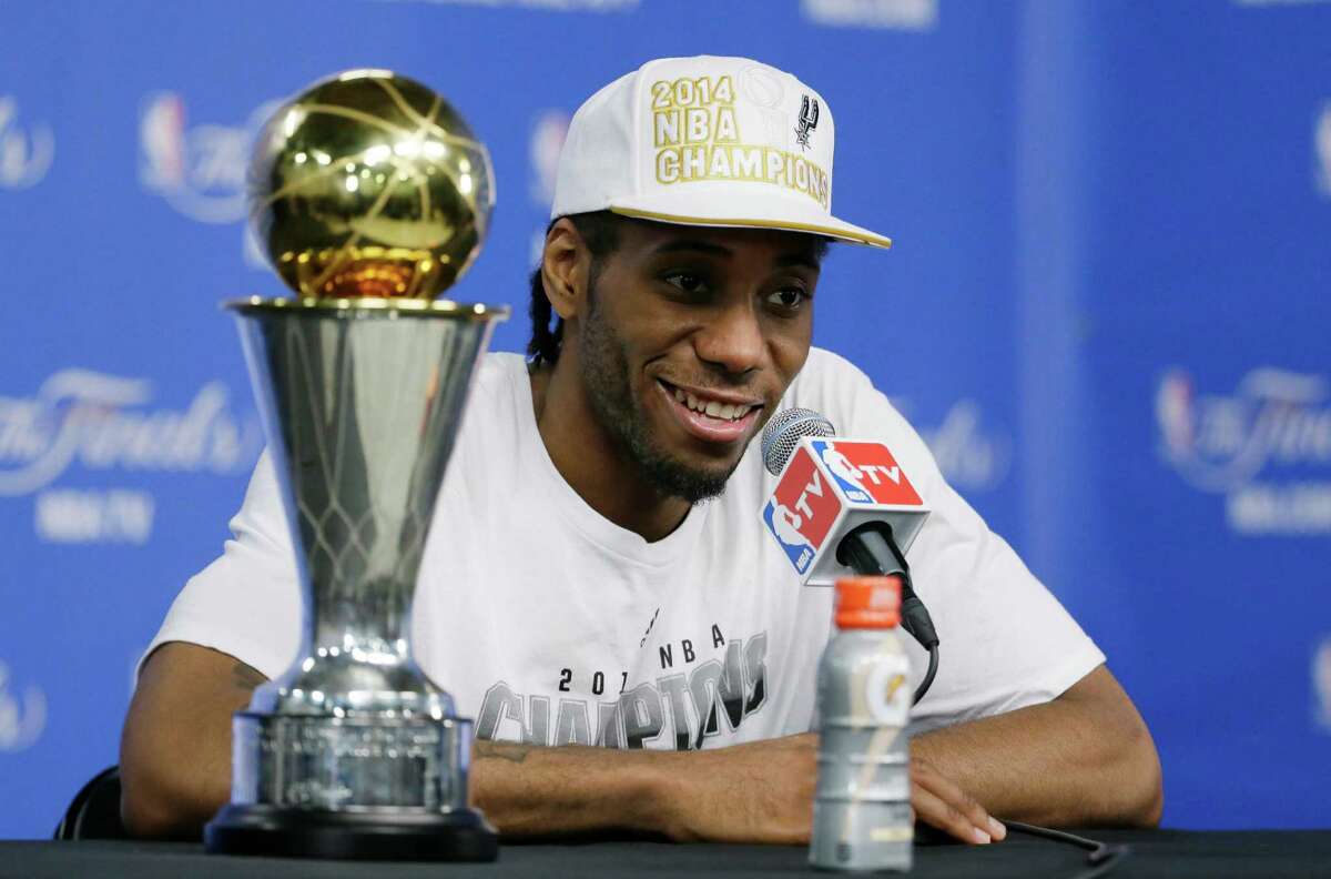 NBA Finals MVP Kawhi Leonard of the Spurs listens to a question at a news conference after Game 5.