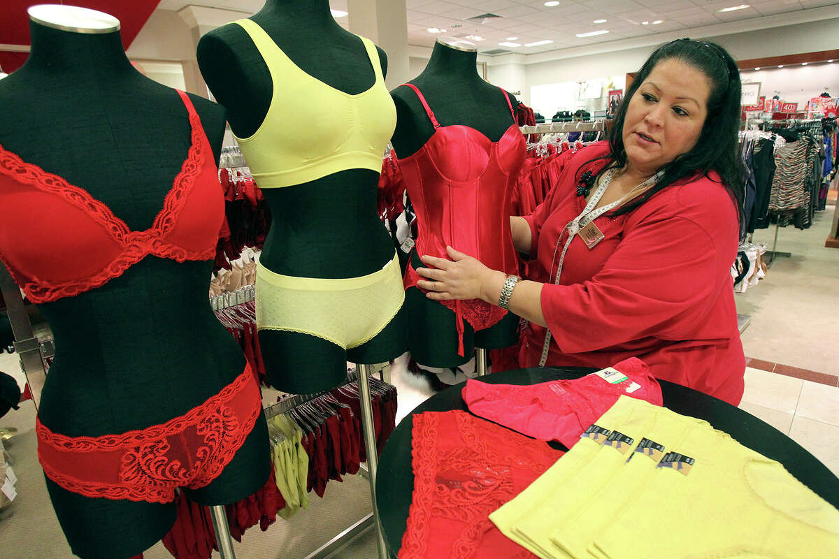 Maria Servin, who works the lingerie department at Dillard’s North Star Mall, says red and yellow panties are hot sellers for New Year’s Eve.