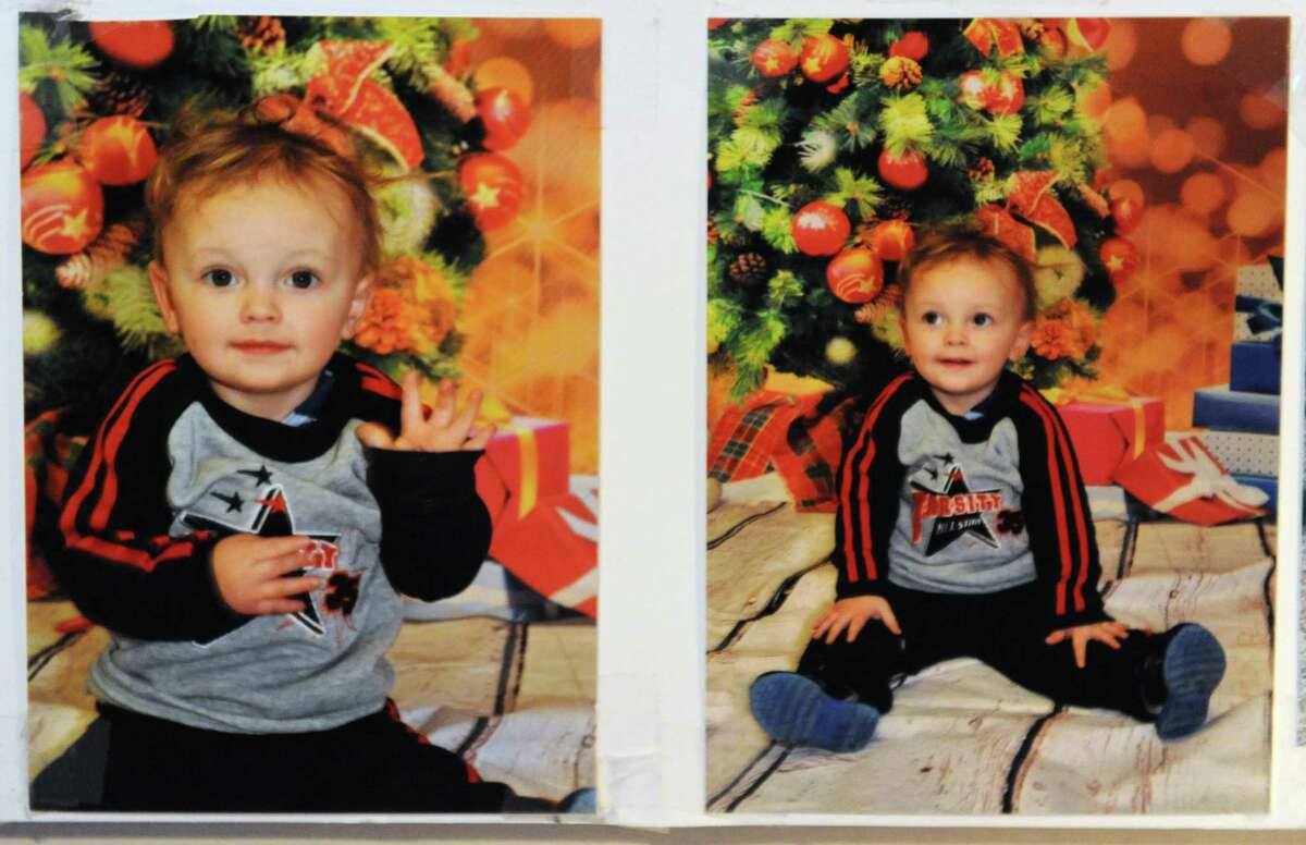 Photos of Eli James Hotaling who died Dec. 9 after consuming liquid nicotine hang on the wall in his grandmother's house Tuesday, Dec. 23, 2014 in Canajoharie, N.Y. (Lori Van Buren / Times Union)
