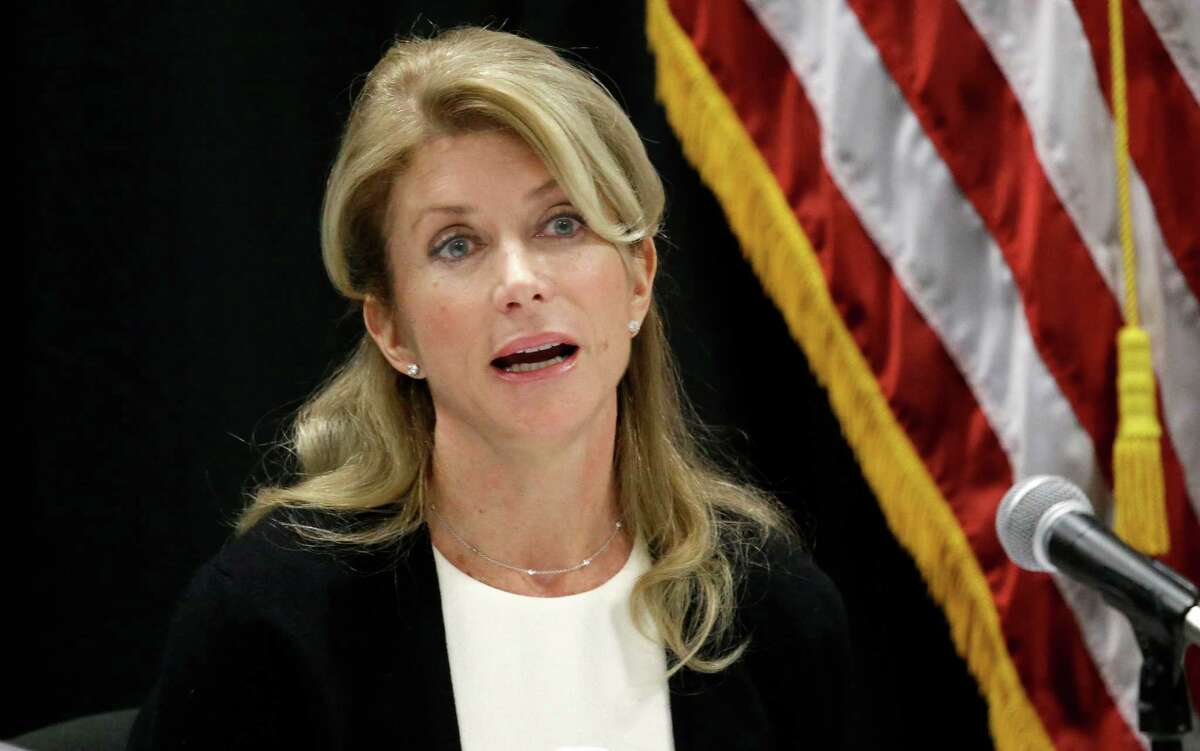 In this Jan. 9, 2014 file photo, Texas Sen. Wendy Davis speaks at an education roundtable meeting in Arlington, Texas. Davis, who has said she would support expanding gun rights, now says that includes allowing concealed handgun license holders to openly carry their weapons in public. (AP Photo/LM Otero, File)