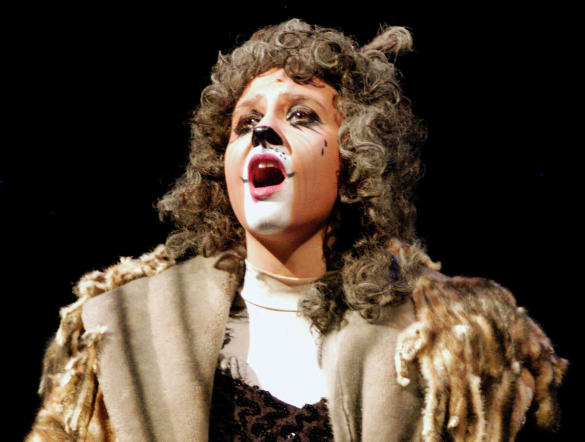 Caitlyn Lalli offers a powerful rendition of "Memory" in her role as Grizabella the Glamour Cat during rehearsal for New Milford High School's production of Andrew Lloyd Webber's musical, "Cats." March 17, 2014