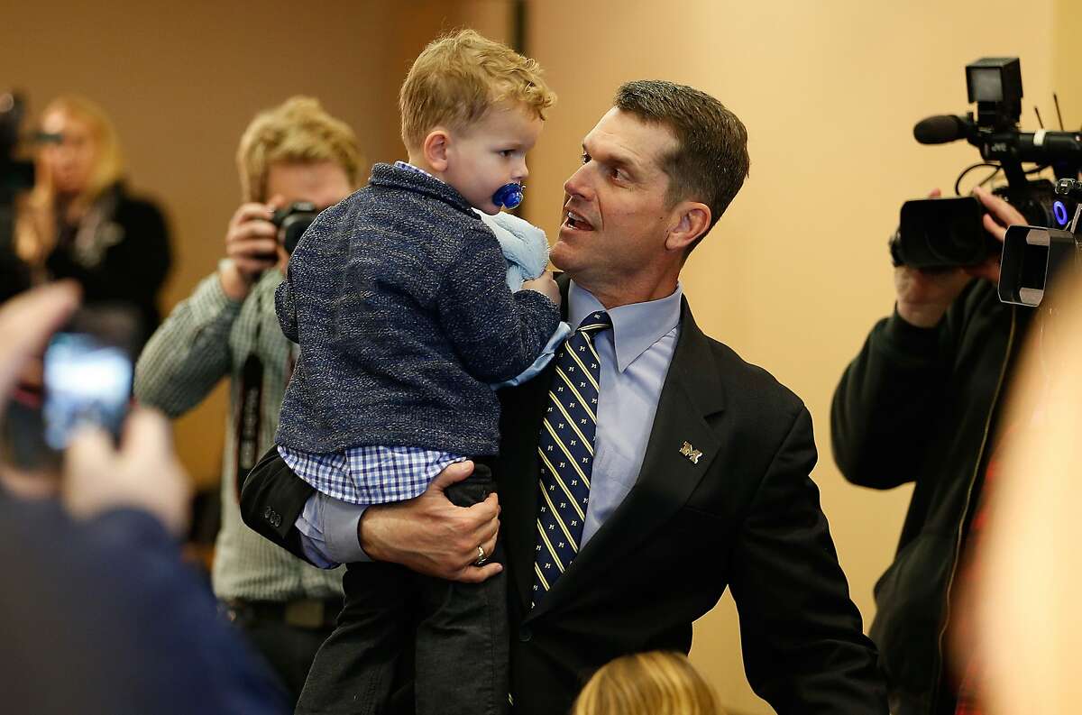 Cute kids with dad at sports press conferences