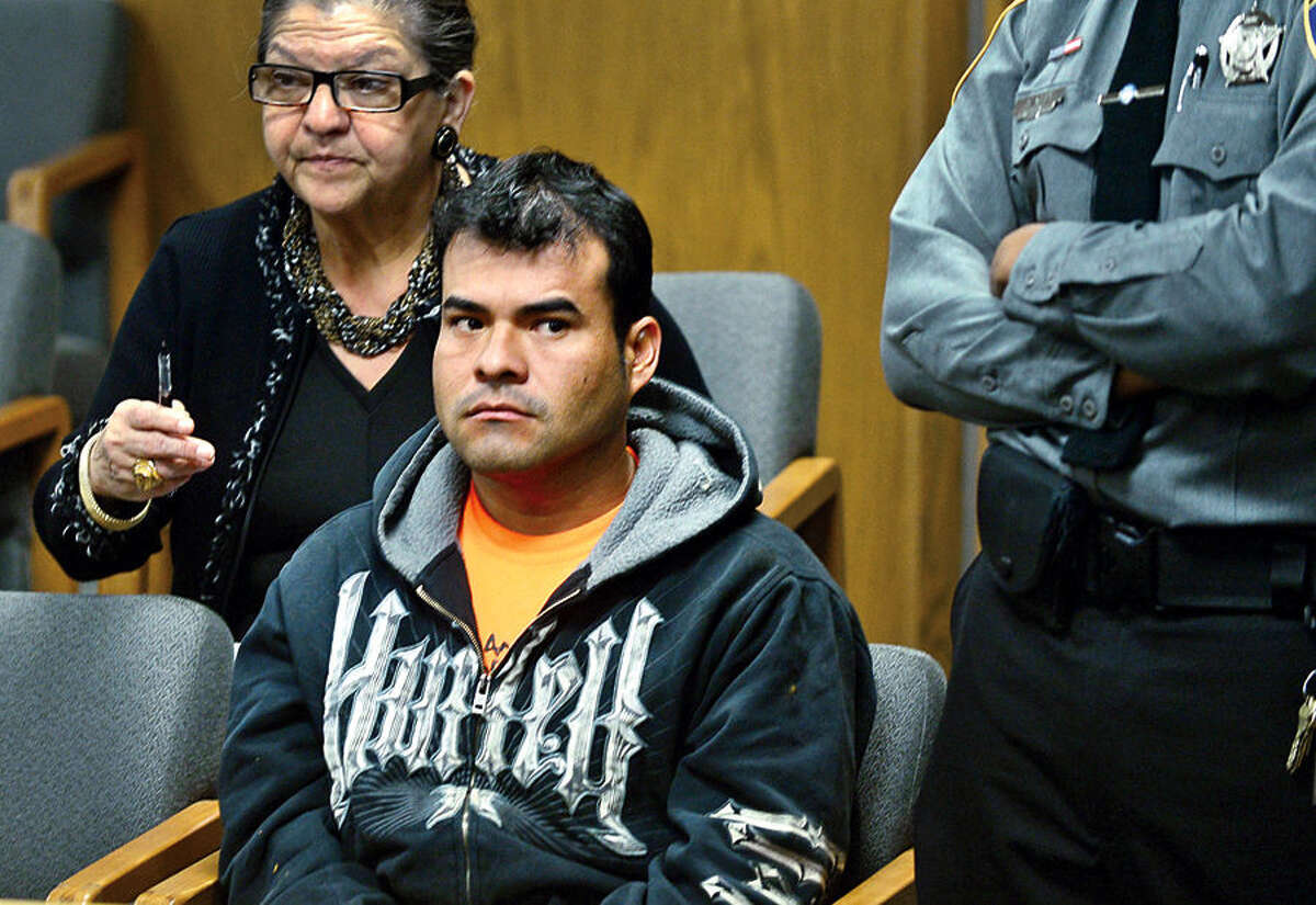 Ramiro Arcos-Garcia, the suspect in the stabbing of taxi driver Jackson Pierre-Louis, was first arraigned in Norwalk Superior Court on Friday, Dec. 12, 2014 with a bond set for $2.5 million.