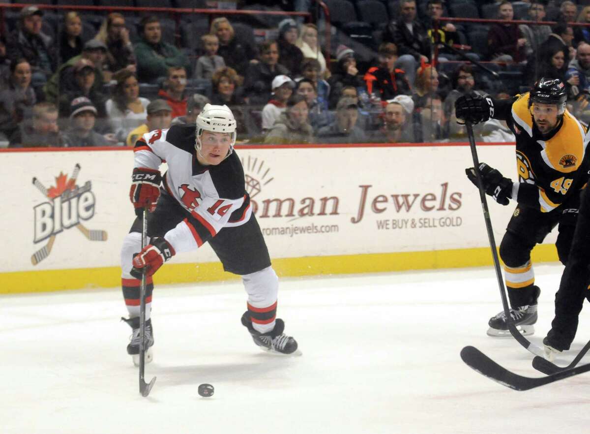 Devil's left winger Reid Boucher looks to pass during their game against the Providence Bruins at the Times Union Center on Tuesday Dec. 30, 2014 in Albany, N.Y. (Michael P. Farrell/Times Union)