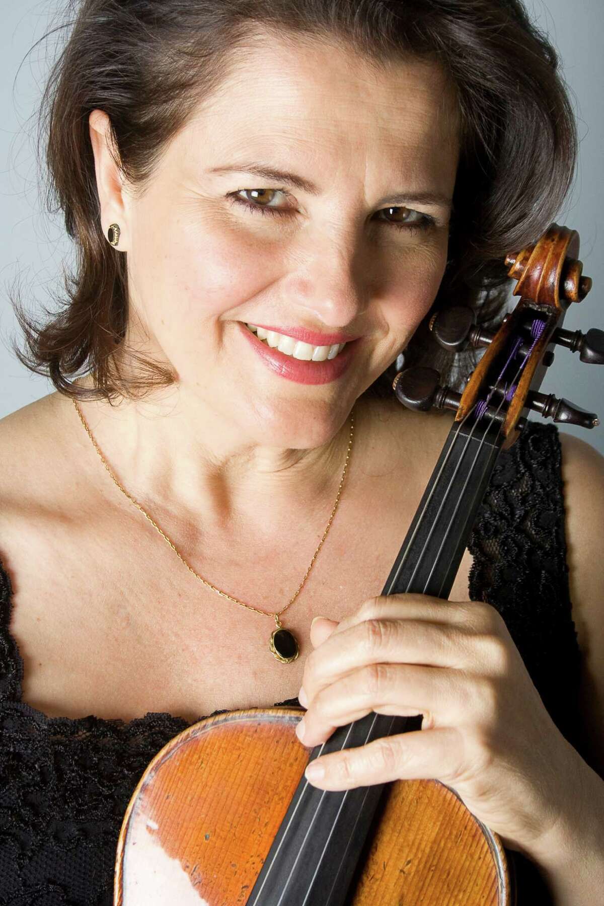 Violinist Sophia Silivos takes the lead in a performance with the St. Cecilia Chamber Music Society on Tuesday.﻿