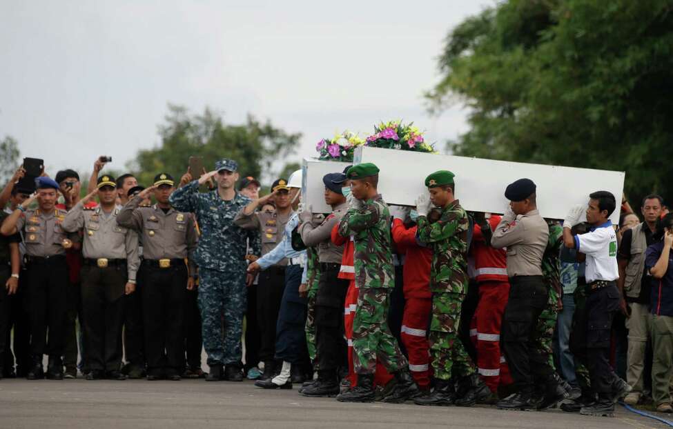 Some AirAsia victims found belted in seats