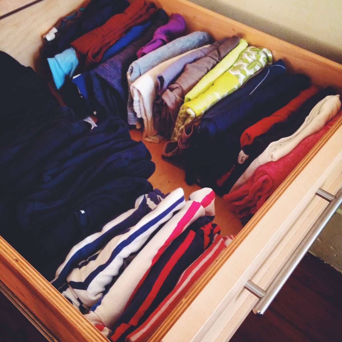 The Konmari T-shirt filing system works: more room, no wrinkles and I can see everything.