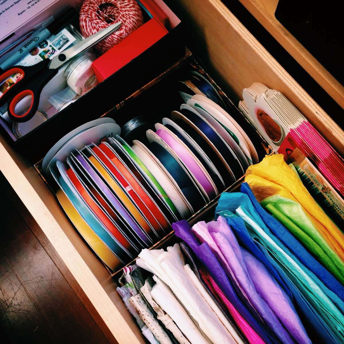 Organizational progress is afoot! Kondo says, “Store all items of the same type in the same place and don’t scatter storage space.”