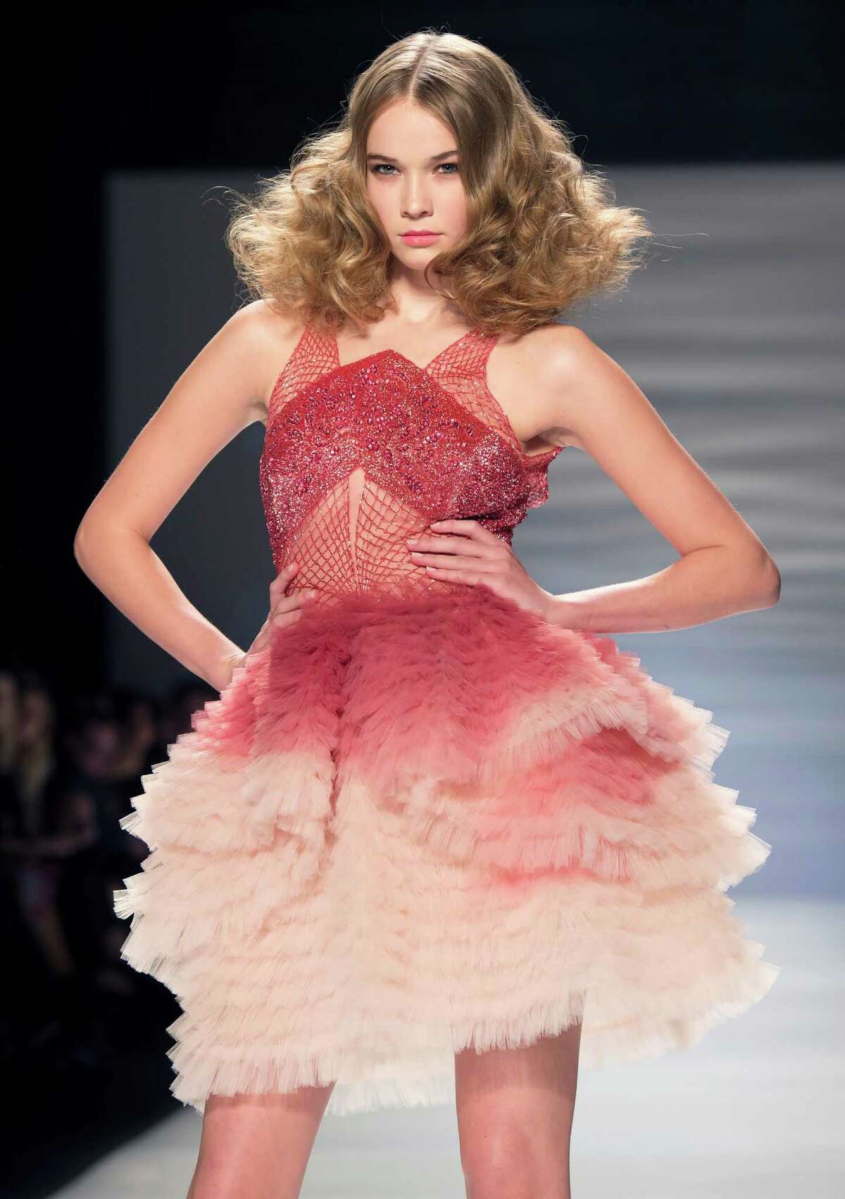 Marsala, the color of 2015, is worn in this look from Mikael D show, part of Fashion Week in Toronto. Marsala, the wine-influenced, red-kissed color of 2015, was chosen by the Pantone Color Institute.