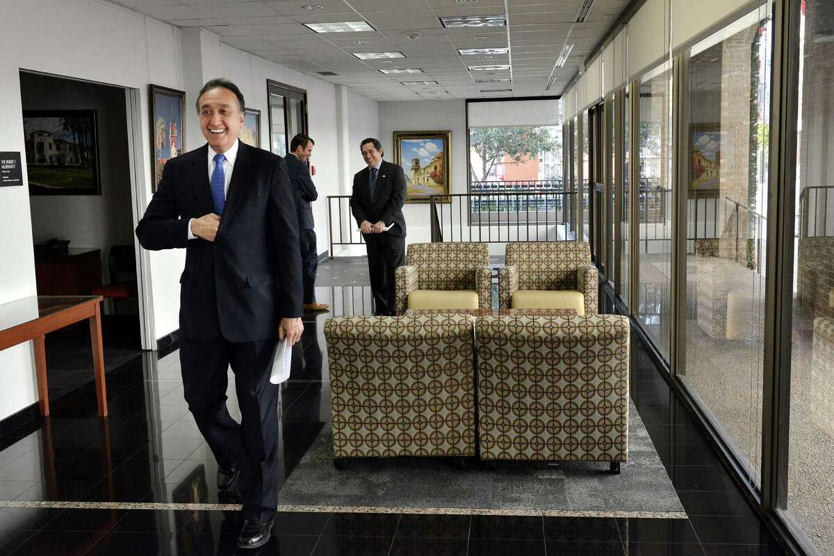 San Antonio Chamber of Commerce Chairman Henry Cisneros walks through the lobby after talking to the media about the police union contract negotiations at the Chamber of Commerce in San Antonio, Tx. on Monday, January 5, 2015.