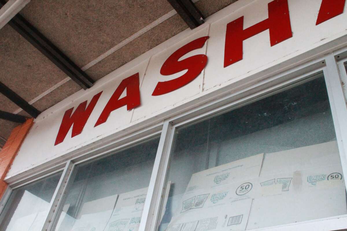 Sign Language: The neighborhood washateria