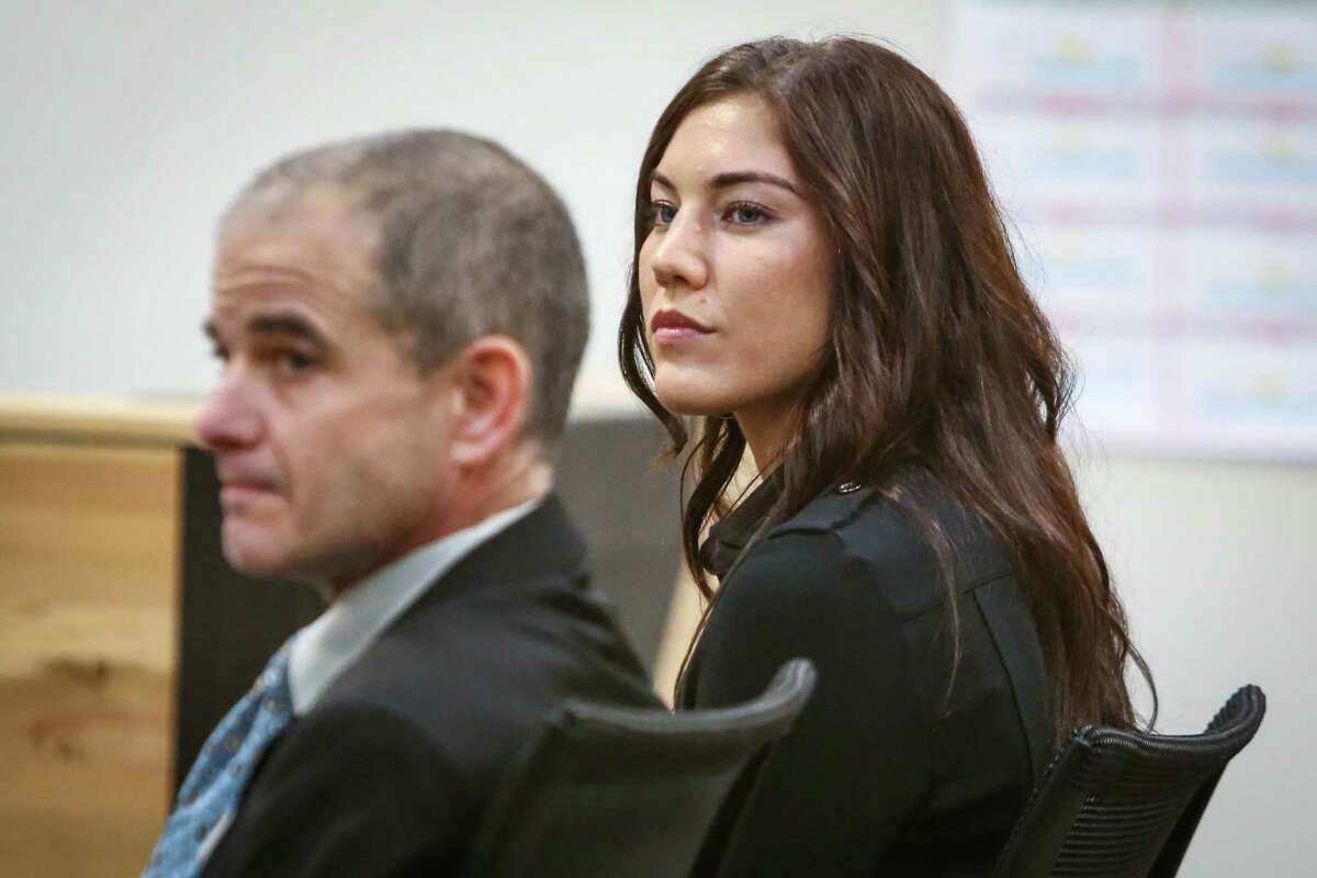 Hope Solo listens in the courtroom of Judge Michael Lambo during a court hearing on Jan. 6, 2015 at Kirkland Municipal Court. Solo was accused of assaulting family members at her home in Kirkland.