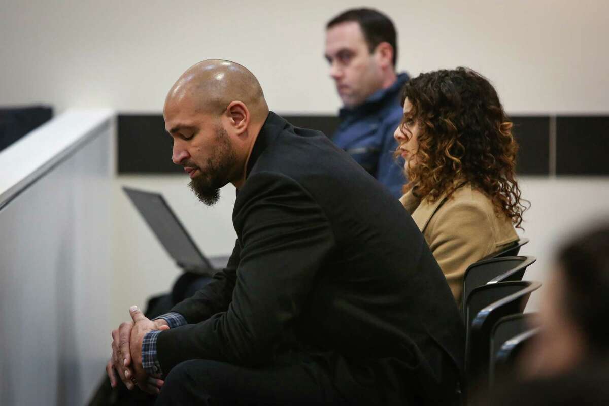 Jerramy Stevens reacts during a hearing for his wife Hope Solo in the courtroom of Judge Michael Lambo on Jan. 6, 2015 at Kirkland Municipal Court. Solo was accused of assaulting family members at her home in Kirkland.