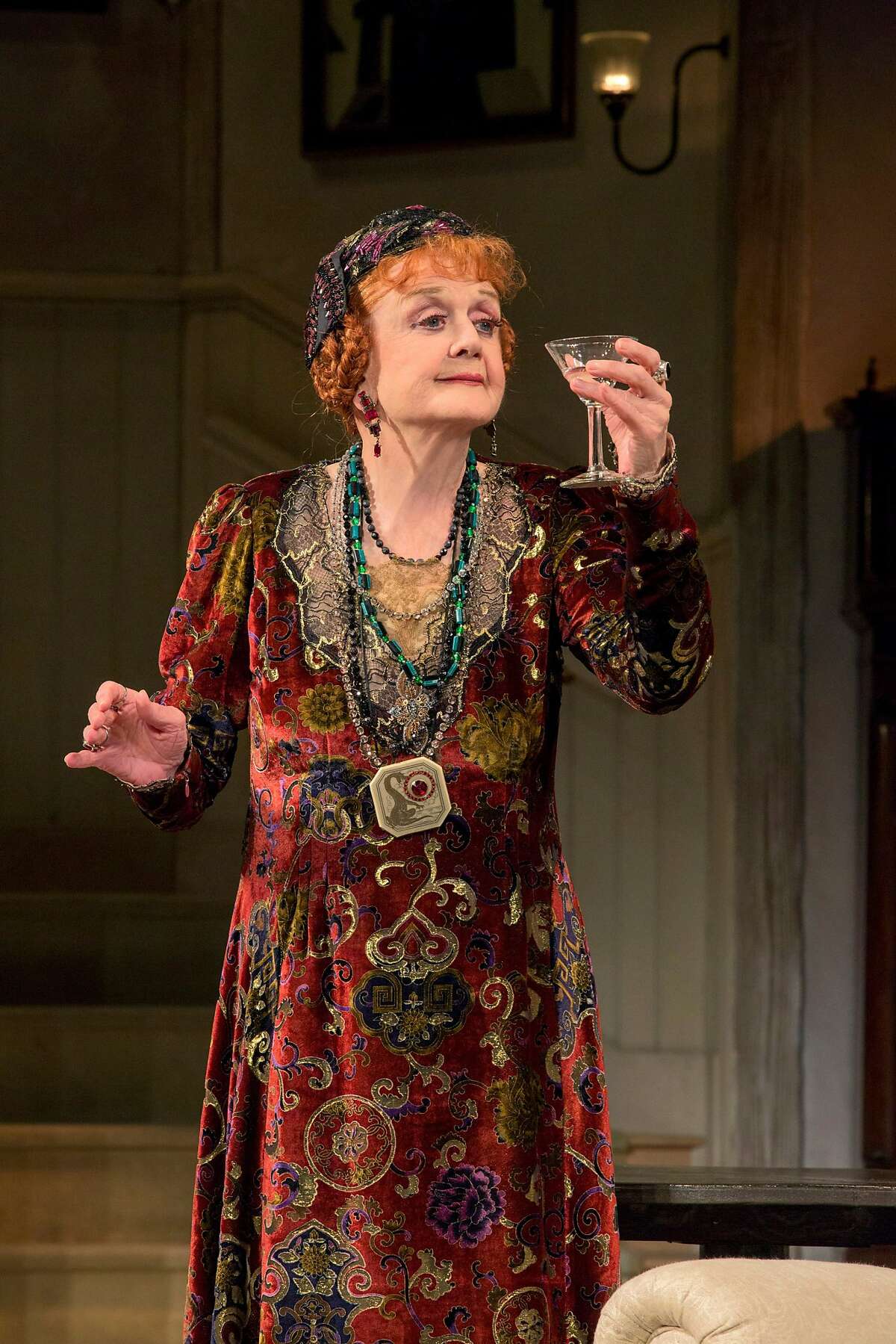 This 2014 photo provided by the Centre Theatre Group shows, Angela Lansbury, in the North American tour of Noel Coward's "Blithe Spirit" at the Center Theatre Group/Ahmanson Theatre from Dec. 9, 2014, through Jan. 18, 2015, in Los Angeles. (AP Photo/Centre Theatre Group, Joan Marcus)