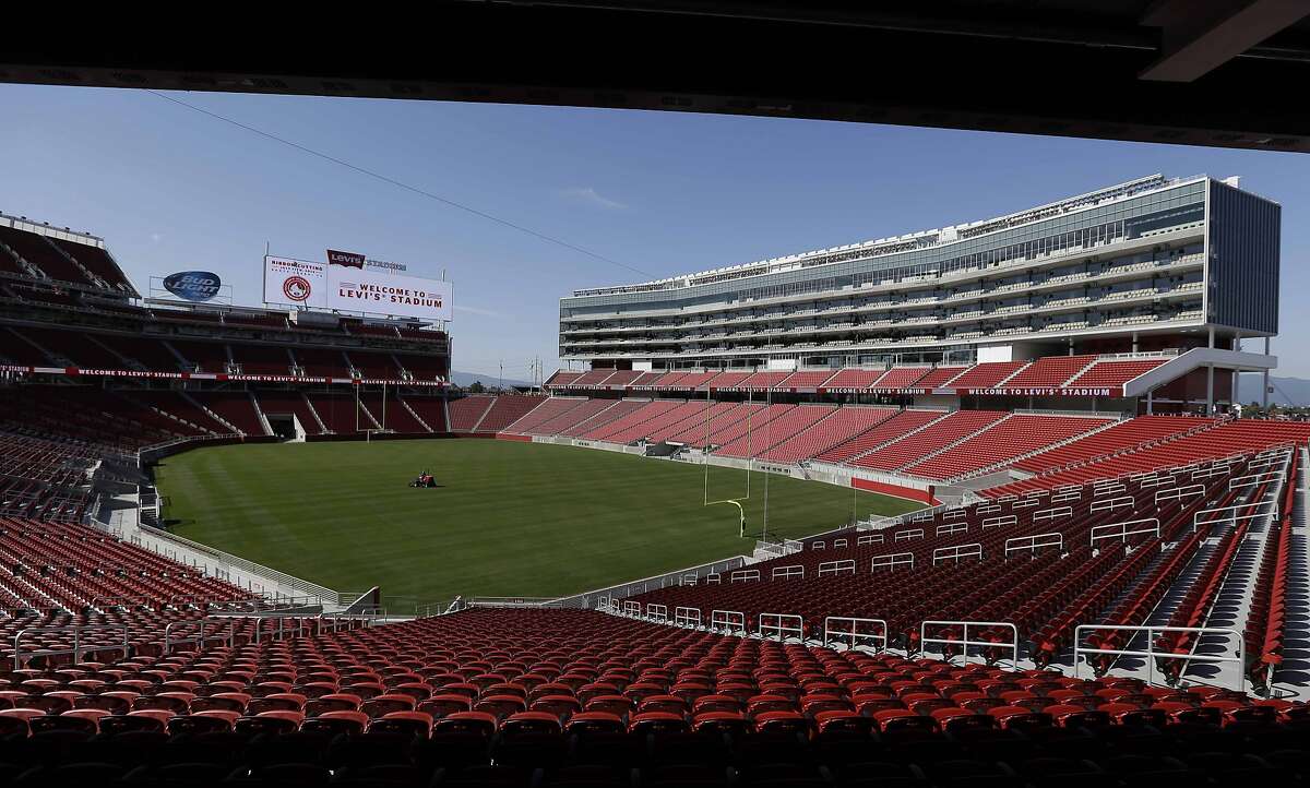 FILE - In this July 17, 2014 file photo, a groundskeeper drives across the field before the ribbon-cutting and opening of Levi's Stadium in Santa Clara, Calif. When the leaders of the U.S. Olympic Committee meet Thursday, Jan. 8, 2015, they'll be deciding on more than a city to put in the running to host the 2024 Summer Games. Leaders from Boston, Los Angeles, San Francisco and Washington made their presentations last month and will not be present while the 15 USOC board members debate the pros and cons of each offering at their meeting at Denver International Airport. (AP Photo/Eric Risberg, file)