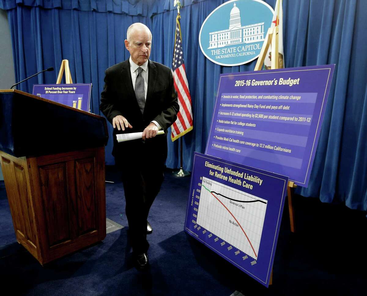 Gov. Jerry Brown leaves a news conference after unveiling his proposed 2015-16 state budget plan at the Capitol in Sacramento on Friday.