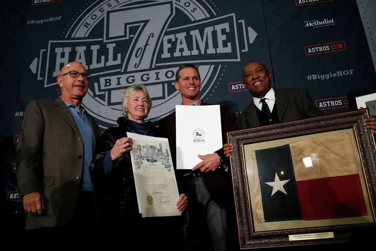 Senator John Whitmire, Mayor Annise Parker, Craig Biggio, and Sylvester Turner with all of Biggio's declarations and a Texas flag that flew over the Texas State Capitol during the Hall of Fame celebration for Craig Biggio at Union Station, Friday, Jan. 9, 2015, in Houston.