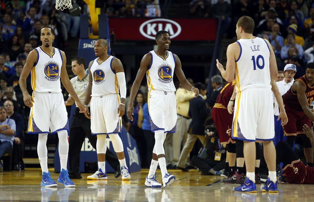 Golden State Warriors' Shaun Livingston, Marreese Speights, Justin Holiday and David Lee during 3rd quarter of 112-94 win over Cleveland Cavaliers during NBA game at Oracle Arena in Oakland, Calif. on Friday, January 9, 2015.