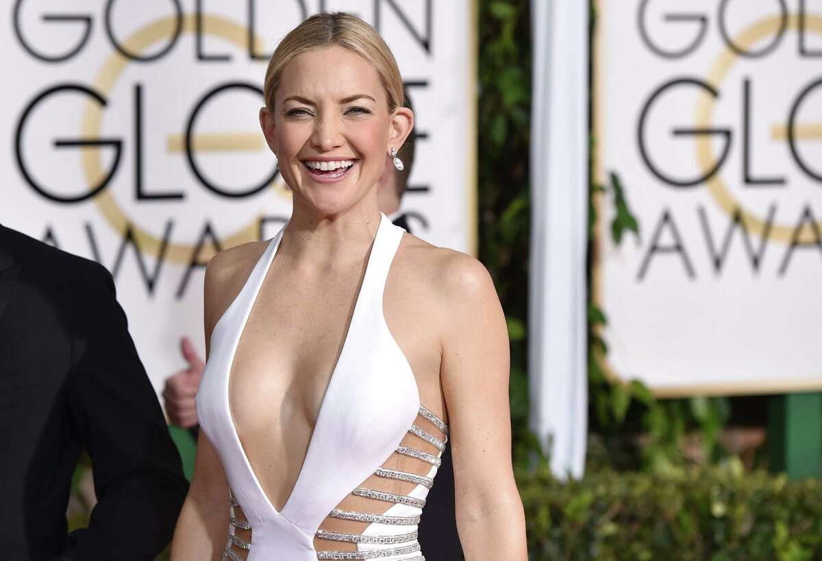 Kate Hudson poses in a Versace gown at the 72nd annual Golden Globe Awards at the Beverly Hilton Hotel on Sunday, Jan. 11, 2015, in Beverly Hills, Calif. (Photo by John Shearer/Invision/AP)