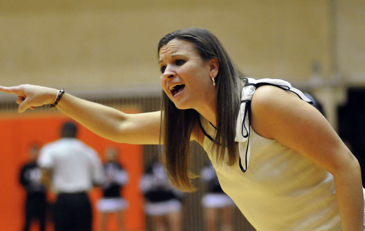 Highlands coach Adrianna Wiatrek yells encouragement to her team in a 2011 game.