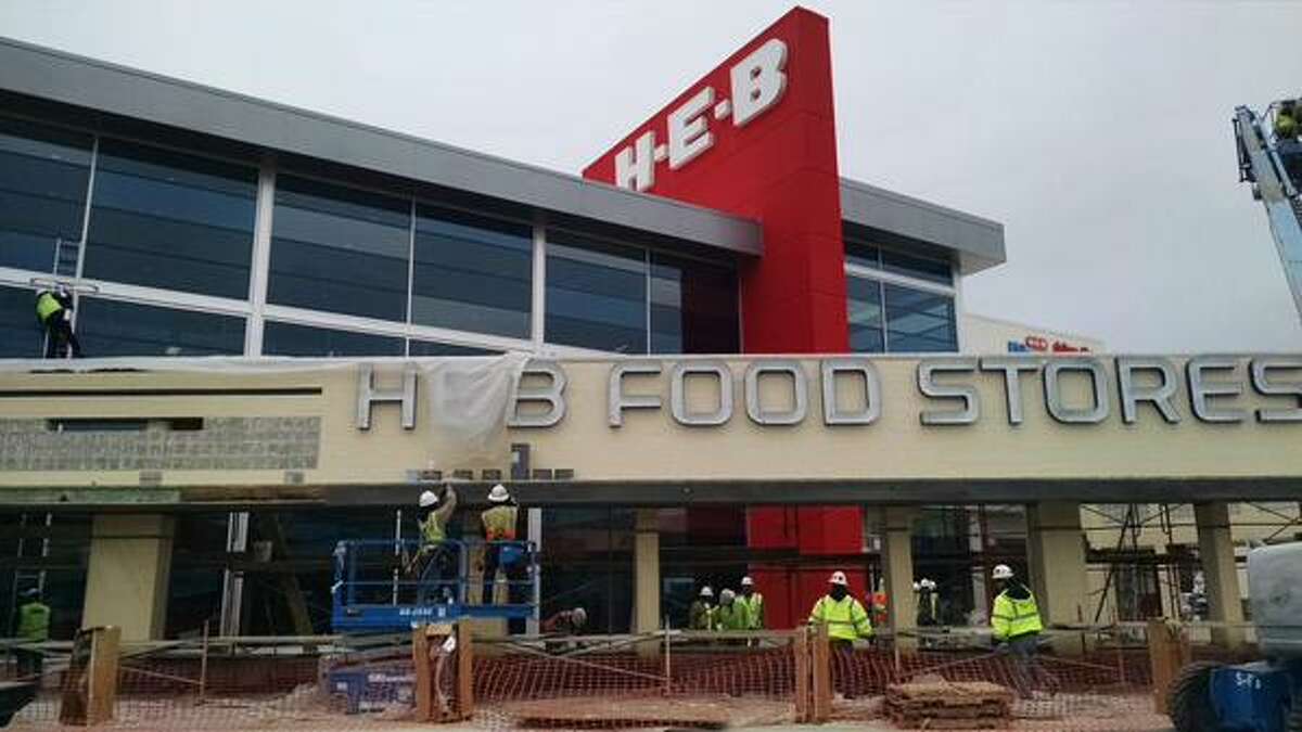 Work continues at the H-E-B Nogalitos, Tuesday, Jan. 13, 2015. The store is undergoing a reconstruction and is scheduled to open on Friday. Most of the building was demolished and the company kept the facade. The size of the old store was 26,000 square feet and the new store's footprint is 62,000 square feet.
