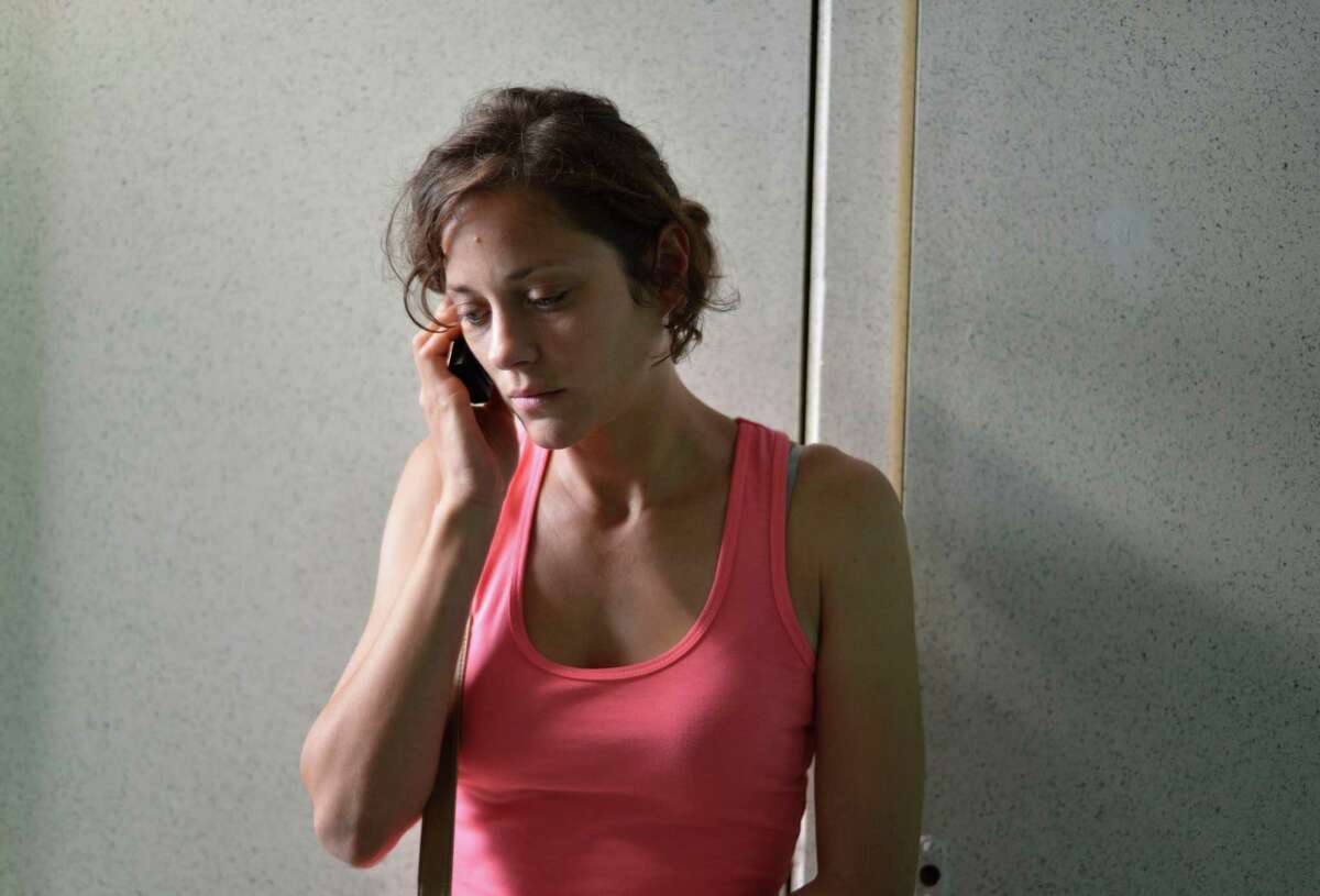 This photo released by Sundance Selects shows Marion Cotillard, as Sandra, in a scene from the film, "Two Days, One Night," written and directed by Belgian filmmakers, Jean-Pierre and Luc Dardenne. (AP Photo/Sundance Selects)