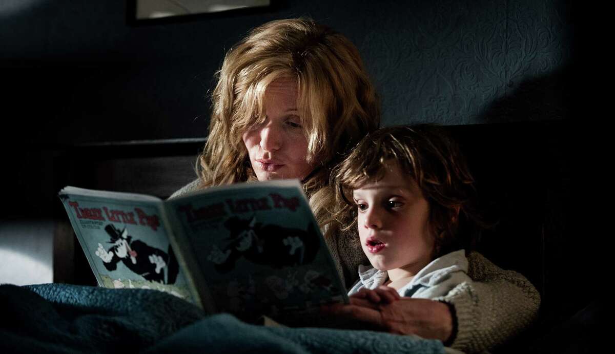 Amelia (Essie Davis) and son Samuel (Noah Wiseman) endure tough times in “The Babadook.”